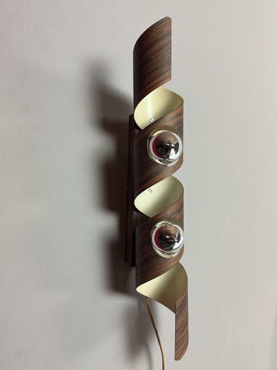 Image 1 of Lámpara de pared Raak Spiral con acabado efecto madera: diseño holandés de mediados de siglo, años 70