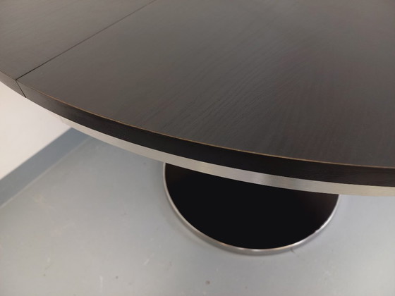 Image 1 of Table ronde de repas vintage en mélaminé esprit bois noir et métal chromé style Space Age / Diner des années 70 avec rallonge in