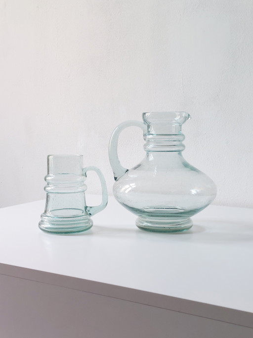 Coppia di caraffe/brocche in vetro vintage di metà secolo