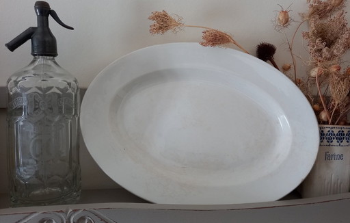 Plato ovalado muy grande de porcelana opaca de Luneville 1880-1900.