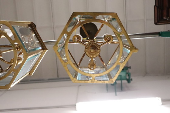 Image 1 of Een paar vintage lantaarns van verguld metaal en glas.