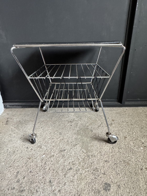 Image 1 of 1950s rolling newspaper rack