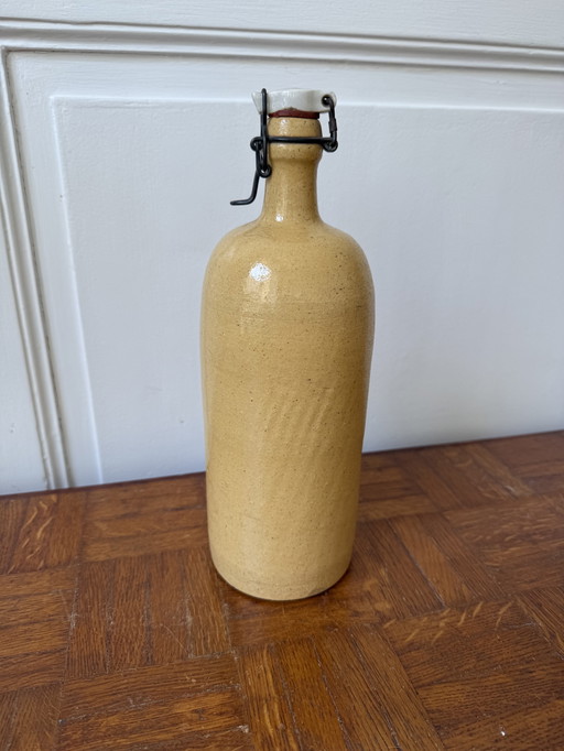 Bottiglia vintage in gres giallo