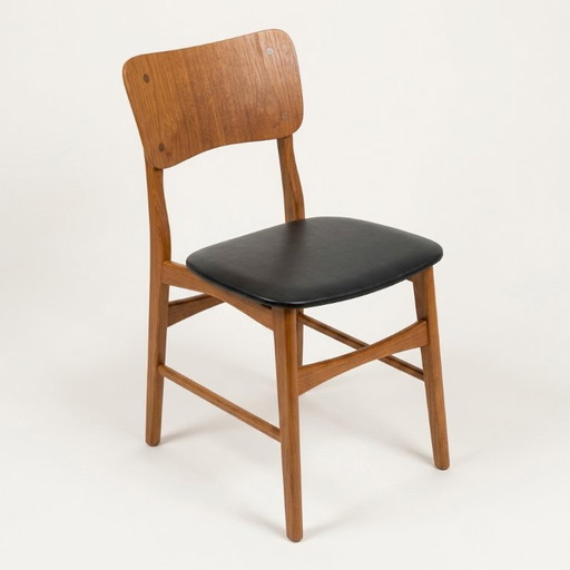 Sedia vintage scandinava in teak e similpelle nera di Kofod-Larsen, Danimarca, anni '60.