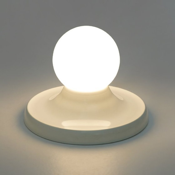 Image 1 of Een paar Light Ball plafondlampen van de gebroeders Castiglioni voor Flos, jaren 60.