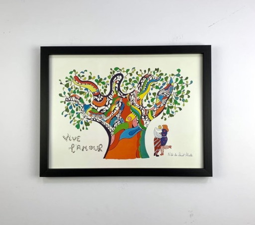Niki de Saint Phalle: " Vive l'amour." Signed in the plate. In high-quality wooden gallery frame and non-mirroring acrylic gla