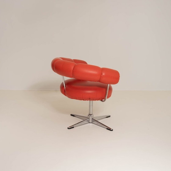 Image 1 of Vintage Swirl Chair in oranje kunstleer