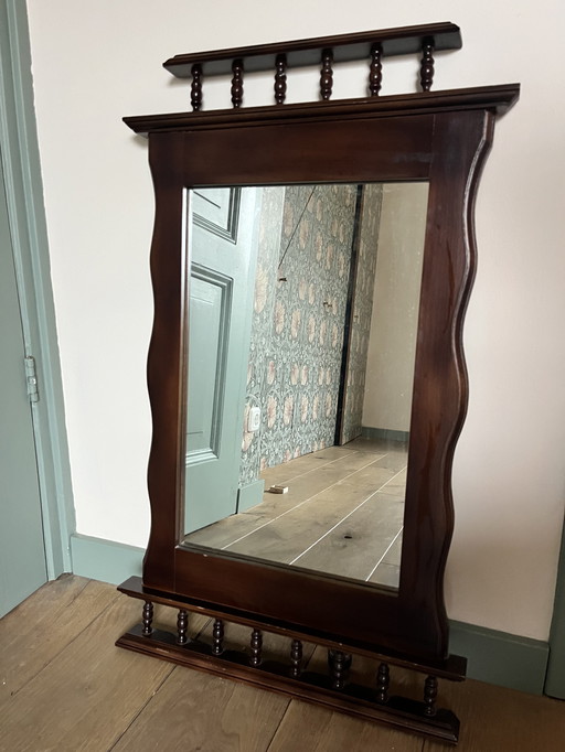 Classic vintage wall mirror with wooden frame