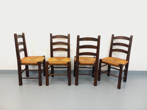 Set of 4 vintage brutalist chairs by Georges Robert in wood and straw from the 1950s and 60s