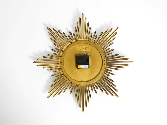 Image 1 of Wunderschöne große originale Sunburst-Wanduhr aus Messing aus den 1960er Jahren von Junghans ATO-MAT