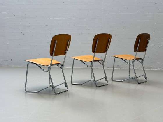 Image 1 of Set van 3 Armin Wirth klapstoelen van gevormd multiplex, Zwitserland, jaren 1950/60.