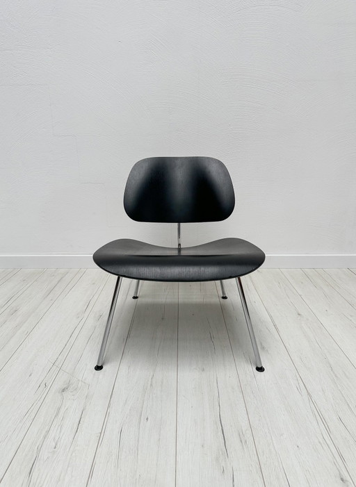 Sillón Eames LCM de madera contrachapada, estilo vintage de los años 70, diseñado por Charles y Ray Eames para Vitra.