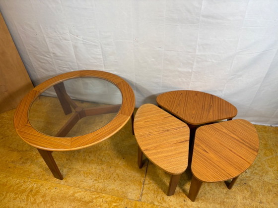 Image 1 of Mid-century retro vintage teak round coffee table with 3 nesting side tables by g plan – 1960    Elegant design|functional