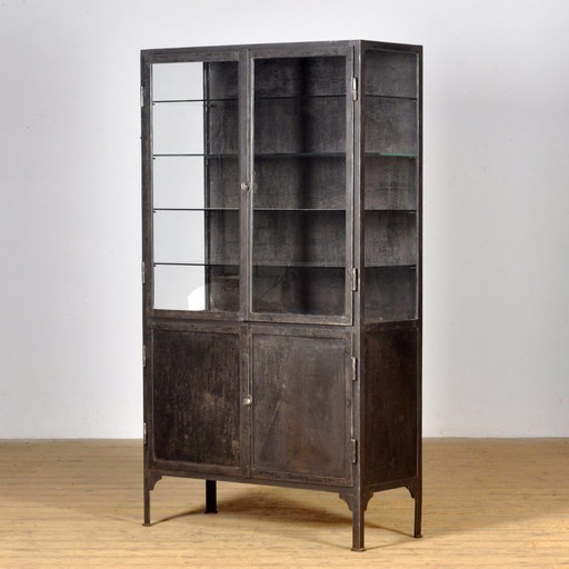 Polished iron medical cabinet, 1930s