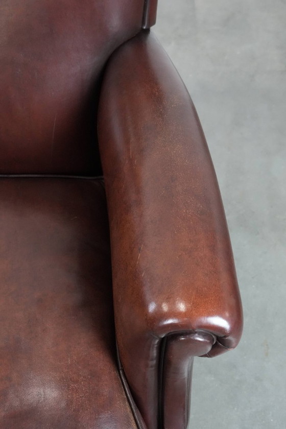 Image 1 of 2 x Schaffellsessel mit zeitlosem Look und wunderschönen dunklen Farben