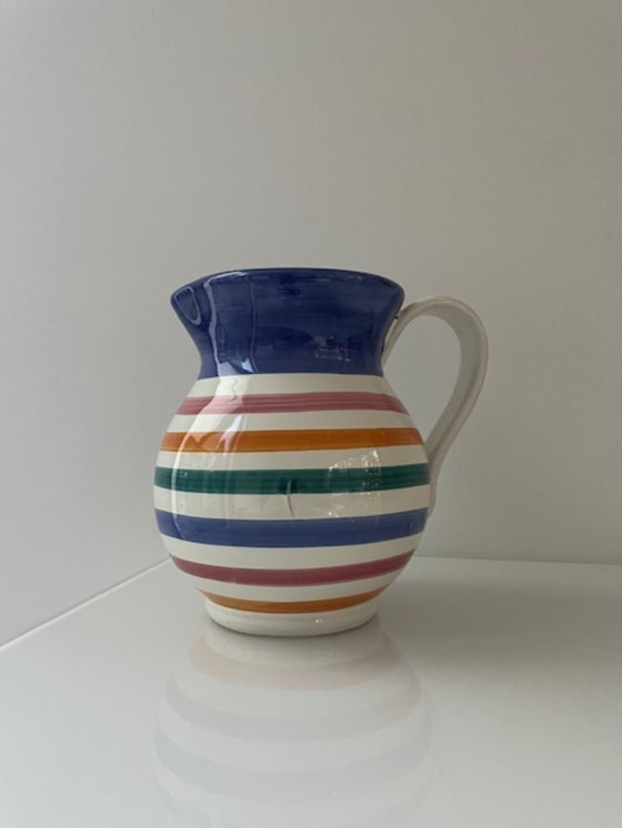 Image 1 of Handgemaakte vintage schenkkan met kleurrijke strepen