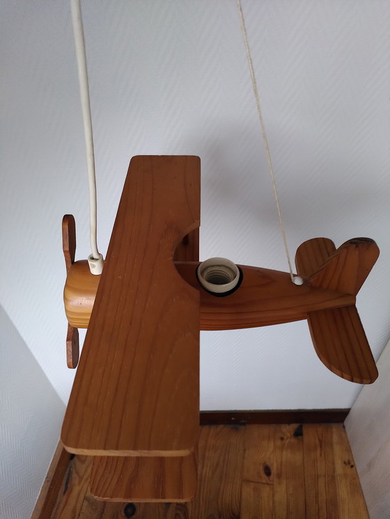 Image 1 of Suspension Avion en bois vintage 