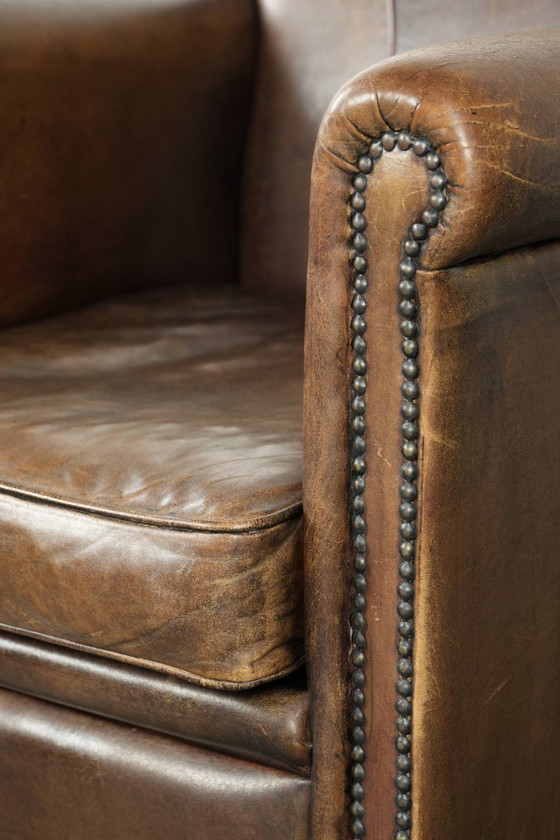 Image 1 of Poltrona in pelle di pecora senza tempo, con una patina caratteristica