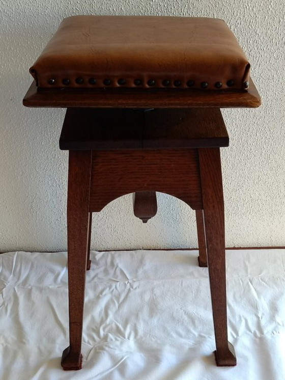 Image 1 of Antica sedia da pianoforte regolabile. Scuola di Amsterdam