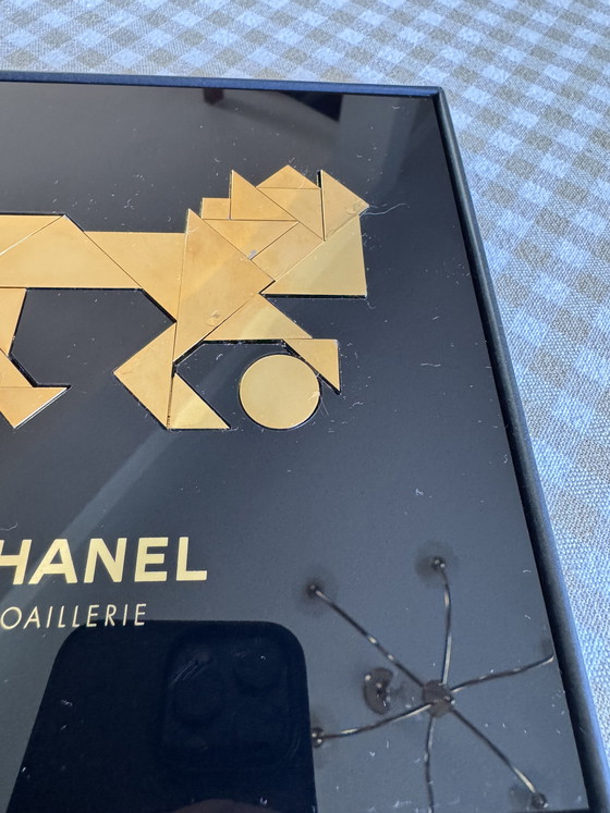 Image 1 of Raro león Chanel Tangram