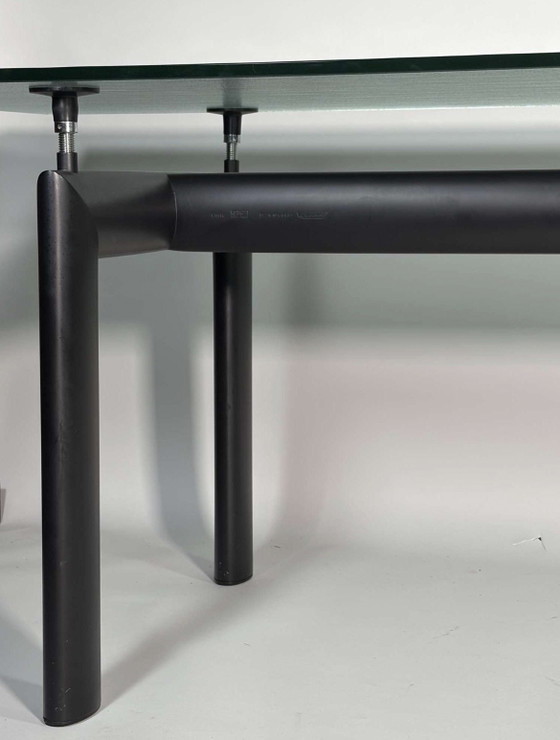Image 1 of Modern and contemporary dining table, model LC6, glass top and black metal legs, Le Corbusier