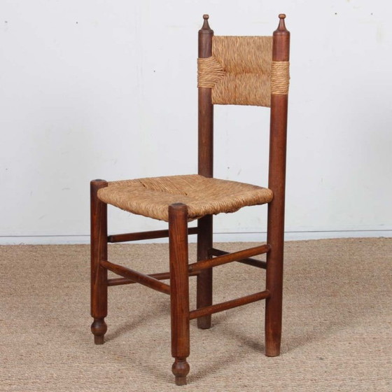 Image 1 of Conjunto de 6 sillas con asiento de paja, obra francesa, 1940
