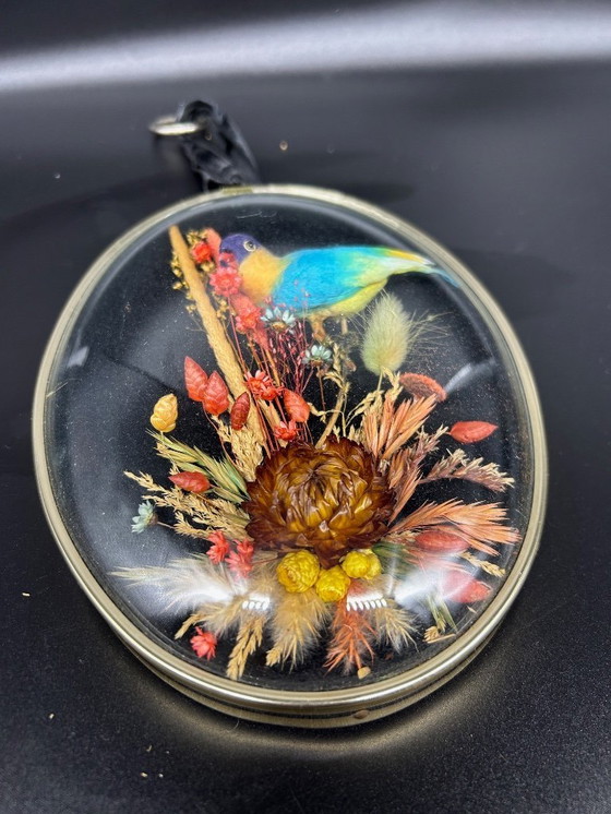 Image 1 of curved glass frame with bird decoration