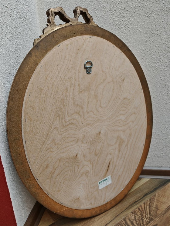 Image 1 of Ovale spiegel met houten lijst, goud uit een nalatenschap