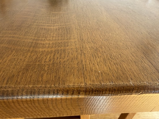 Image 1 of Handgemaakte massieve eiken tafel met 6 stoelen