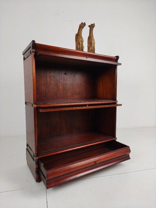 Libreria modulare Globe-Wernicke in mogano con cassetti sottostanti