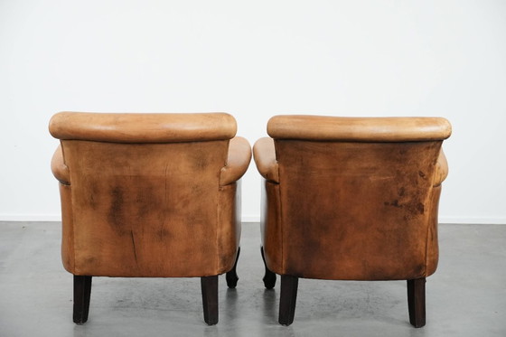 Image 1 of 2 x Subtiele vintage schapenleren fauteuil met een mooie lichte kleur