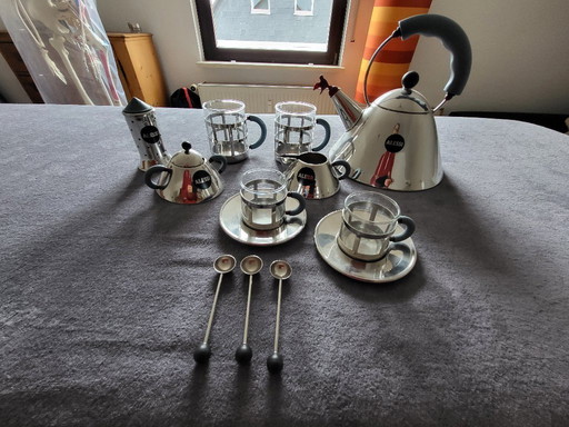 Alessi kettle, tea glasses, espresso glasses, milk, sugar, spoon, salt