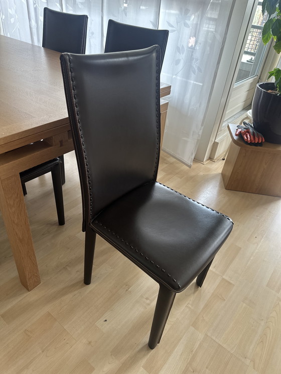 Image 1 of Roche Bobois eettafel set met 6 lederen stoelen