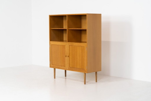 Eikenhouten boekenkast van Rud Thygesen & Johnny Sørensen voor HG meubelen (Denemarken, jaren 60).