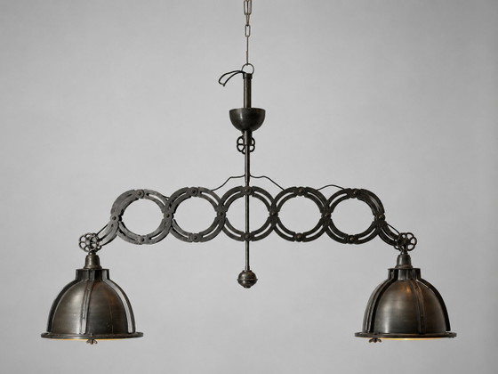 Suspension industrielle en forme de ciseaux (photo 2 of 8)