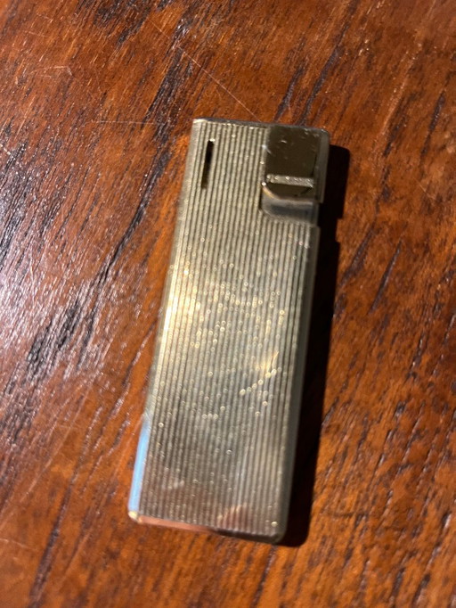 For sale: 1 gold or gold-plated Flaminaire lighter