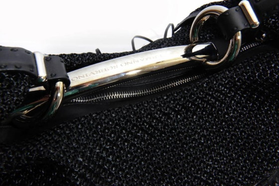 Image 1 of Ermanno Scervino, borsa a mano nera intrecciata con frange in pelle.