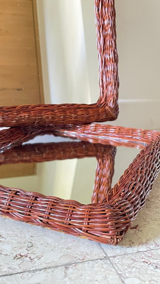 Image 1 of Een paar vintage spiegels van riet en rotan.