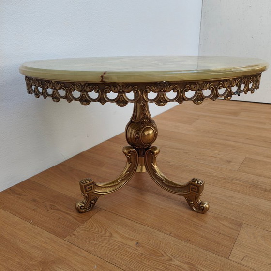Image 1 of Vintage round Regency coffee table with marble top and brass base