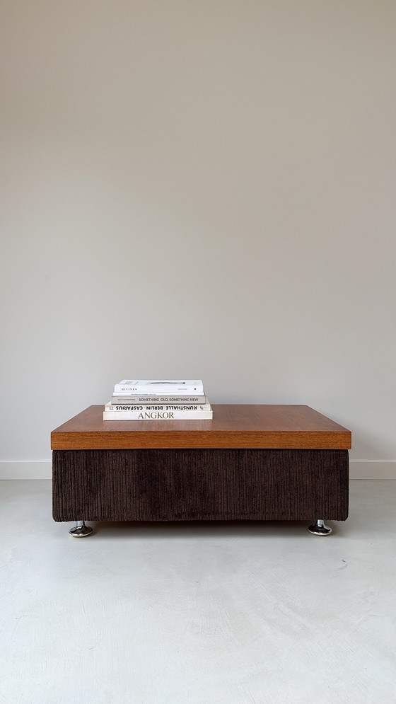 Image 1 of Coffee table with brown rub fabric, wooden top and chrome legs