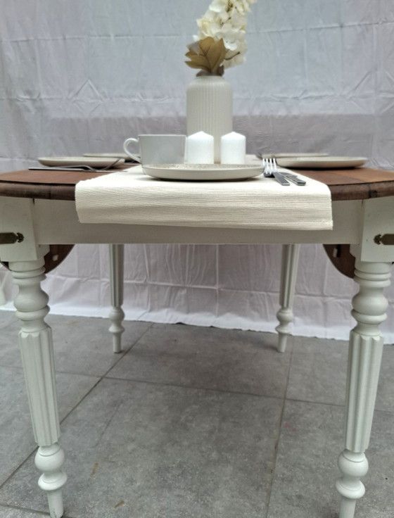 Image 1 of 🪵 Solid oak table with drop leaves — white lacquered legs — vintage chic style