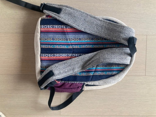 backpack Himalayan with Banksy-like "Flower trower" or "Love is in the air"