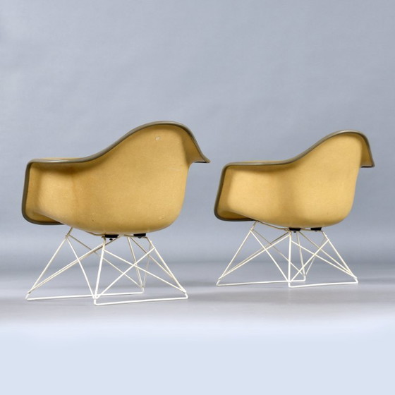 Image 1 of Pair of Eames for Herman Miller LAR Shell Chairs with Yellow Naugahyde Pads