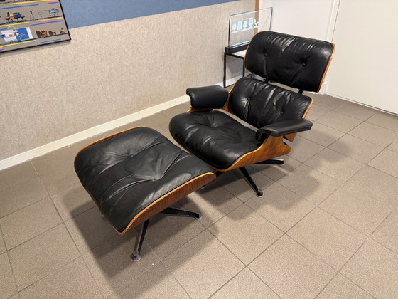 Image 1 of Herman Miller / Contura | Charles & Ray Eames | Lounge Chair & Ottoman | Rosewood & Black Leather | 1x Set
