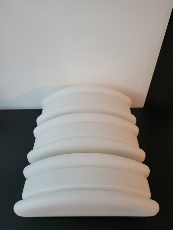 Image 1 of 3 RAAK (bathroom) wall lamps with opaline glass shade and stainless steel frame.