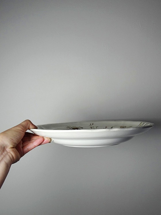 Image 1 of Antique Longchamp deep dish with polychrome ironstone daisies
