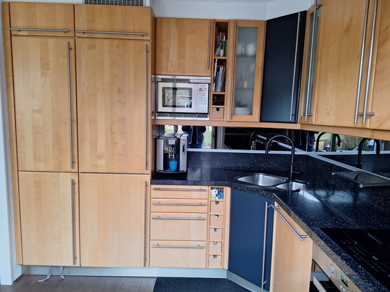 Image 1 of Eggersman corner kitchen with solid wood doors