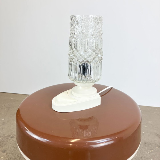 Image 1 of tafellamp van SAKU, glazen zak op kunststof voet, jaren 1970