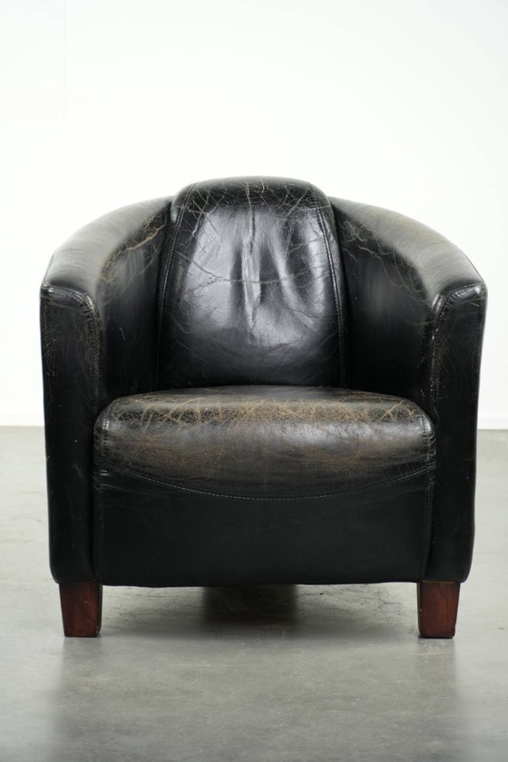 Image 1 of Zwarte vintage rundleren Aviator design fauteuil met een karaktervolle uitstraling