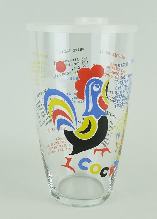 Coctelera de cristal de mediados de siglo con recetas de la década de 1950